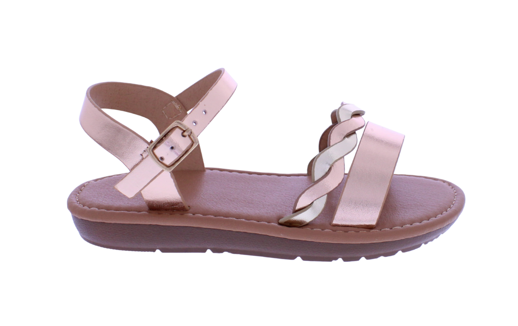 Pink sandal with multiple straps on a white background