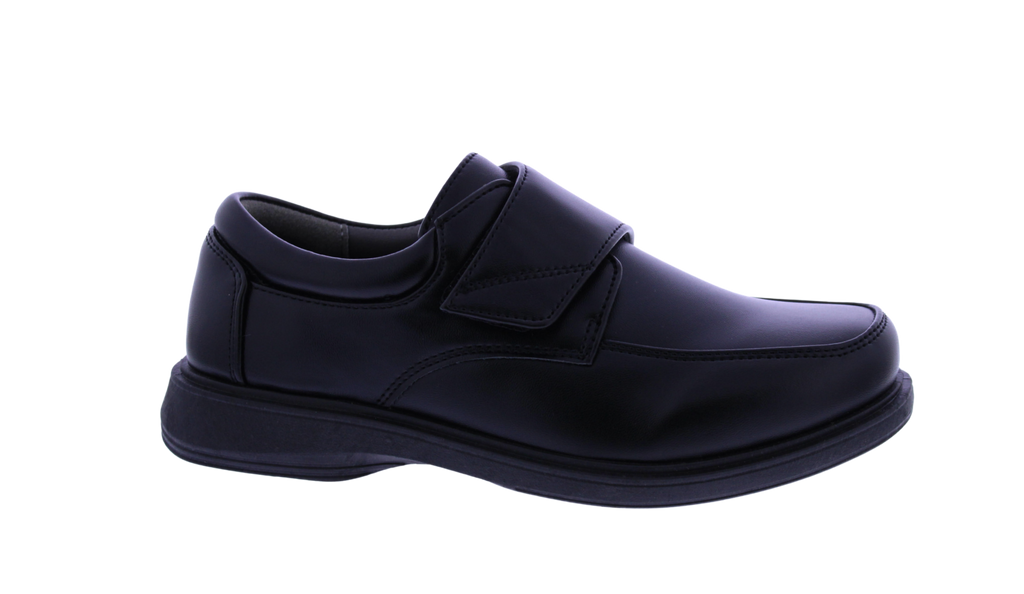 Black shoe with velcro strap on a white background