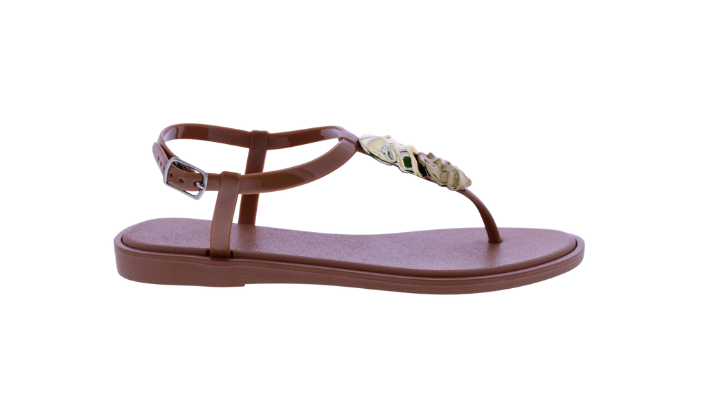 Brown sandal with a decorative strap on a white background