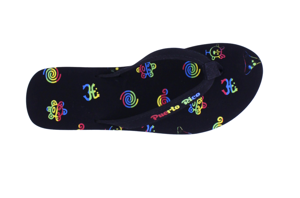 Black flip-flops with colorful designs on a white background