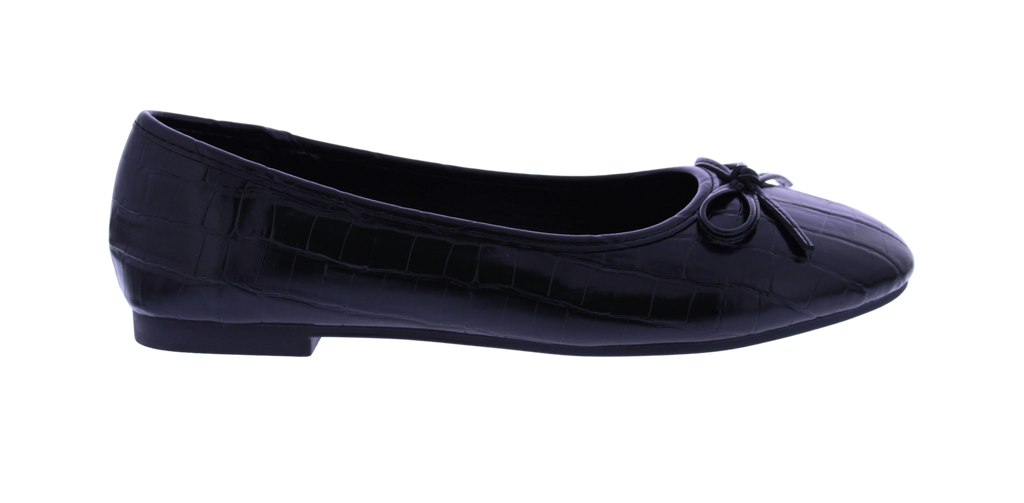 Black flat shoe with a bow on a white background